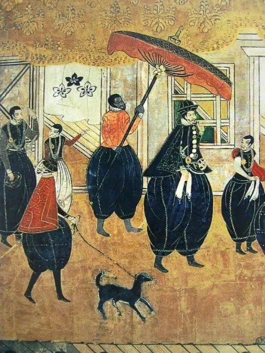 Pintura japonesa nanban que representa un grupo de portugueses acompañados de un sirviente negro